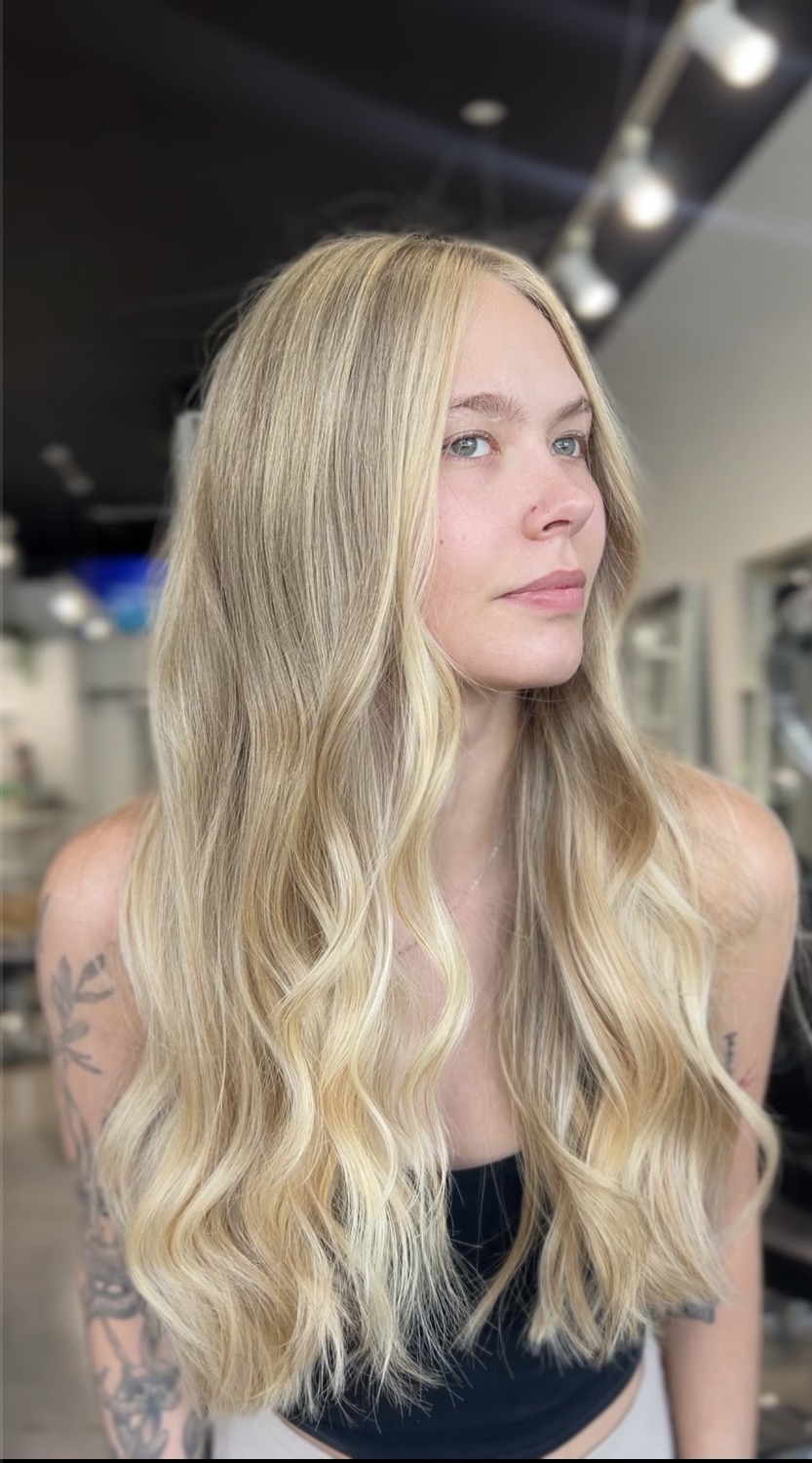 Dimensional blonde waves created by Jasmine Reyes in Fort Lauderdale